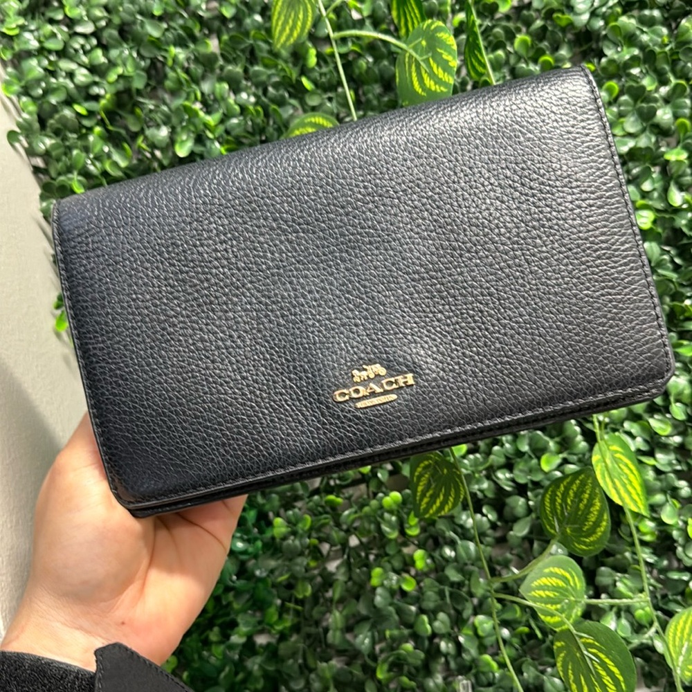 Black Authentic Coach Clutch .. 1 year old .. normal wear , .. $100 OBO
